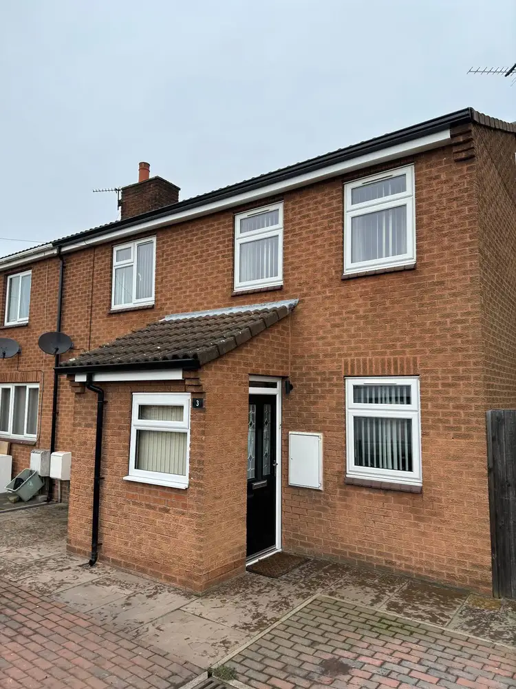 Brick terraced house following Gutterworx roofline work