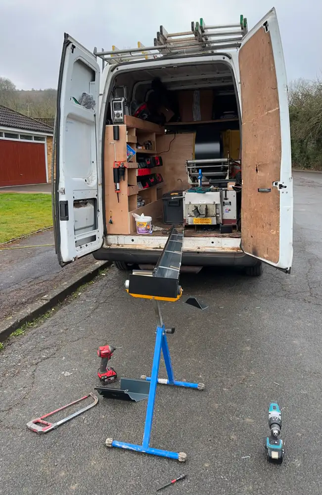 Gutter forming machine and tools beside the Gutterworx van